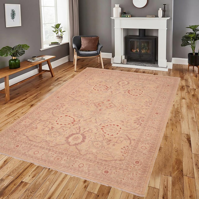 "Enhance the ambiance of your home with this magnificent Persian-influenced Turkish hand-knotted rug made by skilled...