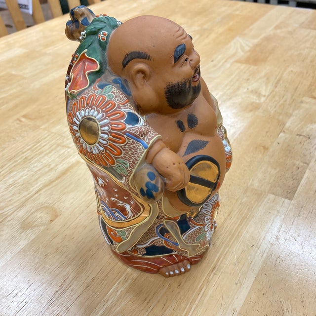 Japanese Kutani Hotei Buddha statue made in the early 20th century. Makers mark shown on the bottom.