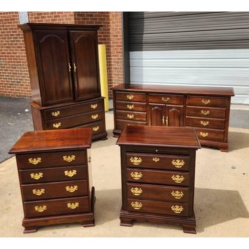 A complete king bedroom suite from Kincaid with a coordinated bed, nightstands, dresser, and clothing armoire. The set...