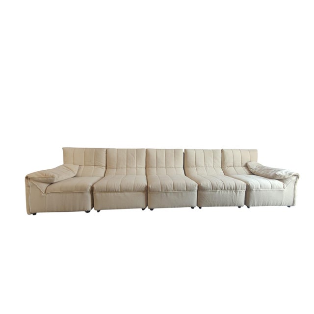 "baia mode" modular sofa with five modules in beige fabric, designed by antonio citterio and paolo nava for b&b italia in...