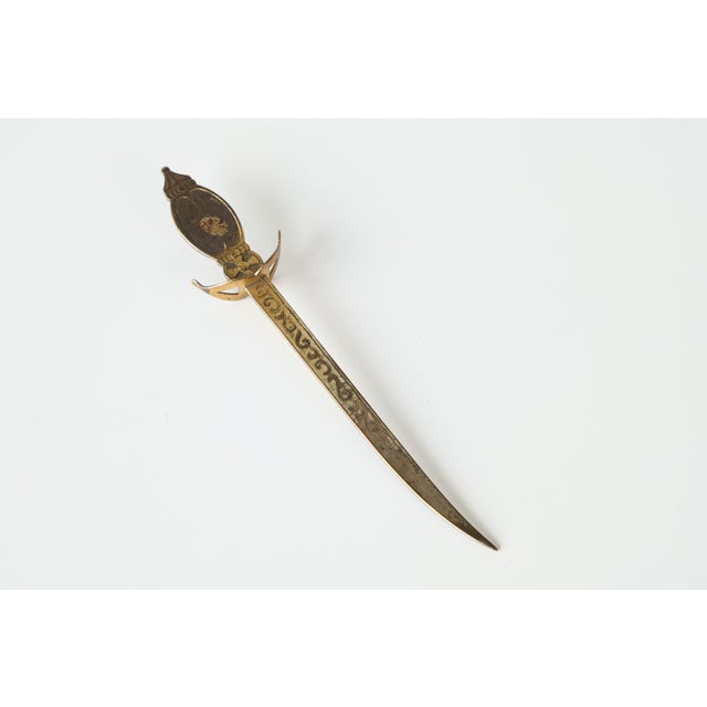 Early 20th Century Sable Shaped Letter Opener. A letter opener with a very distinct sable style design - early 20th...