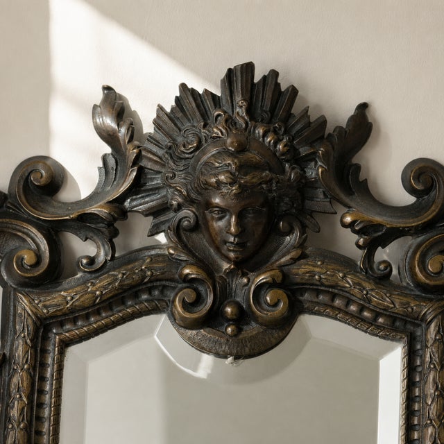 Splendid antique bronze mirror dating from the Second Empire, 19th century. Richly decorated in the Louis XV Rococo style,...
