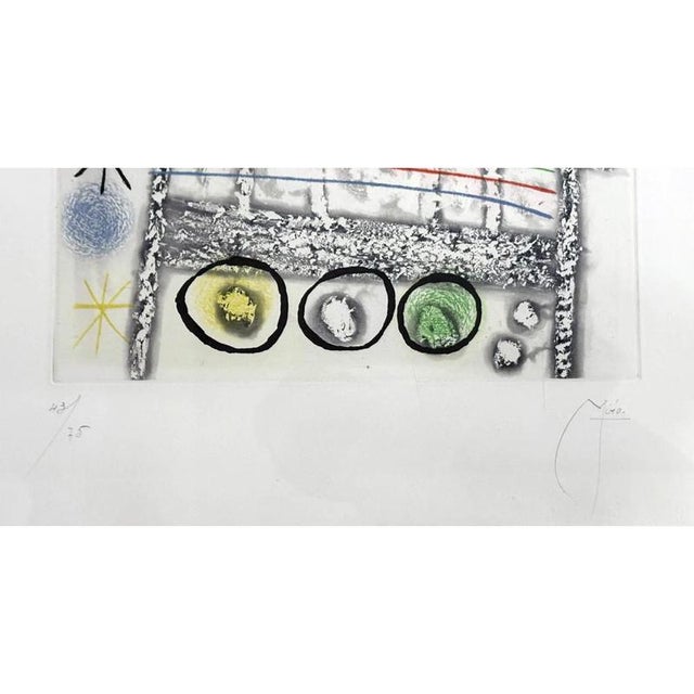 Joan Miró (1893-1983). Figurative composition Les Forestiers Gris from 1958. Framed lithograph. Dimensions: 60 x 65 cm,...