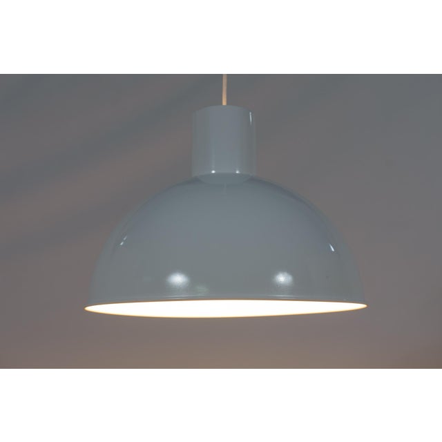 Hanging lamp Bunker designed by Jo Hammerborg for the Danish manufacture Fog & Mørup in Denmark in the 70s. The lamp has...