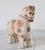 This is a Pucará horse, a traditional ceramic figurine from Peru. The "Caballo de Pucará" is a handmade figurine created...