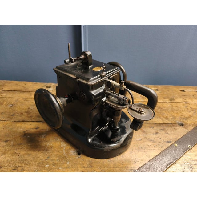 This machine was manufactured in Germany at the beginning of the 20th century. It was used for sewing fur, leather or...