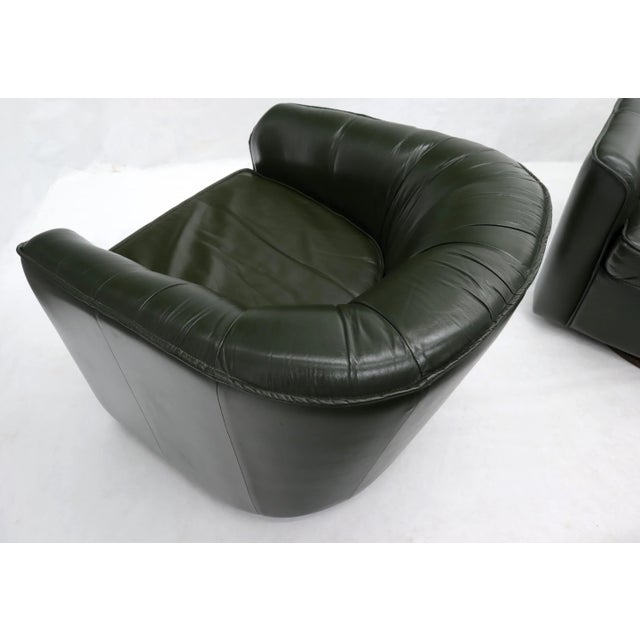 Pair of Swivel Dark Olive Green Leather Upholstery Lounge Chairs with
