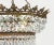 Beautiful tiered crown waterfall crystal chandelier from 1930s France. A myriad of multi-faceted octagonal and drop...