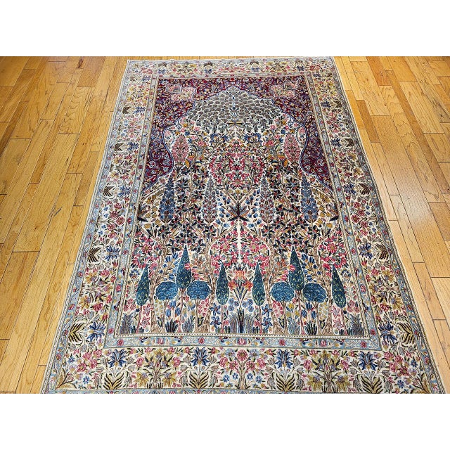 "A beautifully detailed vintage Persian Kerman Lavar rug, handwoven in the first half of the 20th century and featuring...