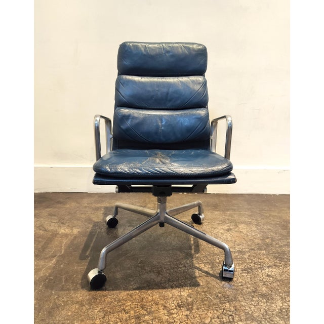 Vintage Ea 216 "Soft Pad" chair by Charles and Ray Eames for Herman Miller. Chair functions properly. Leather has lovely...