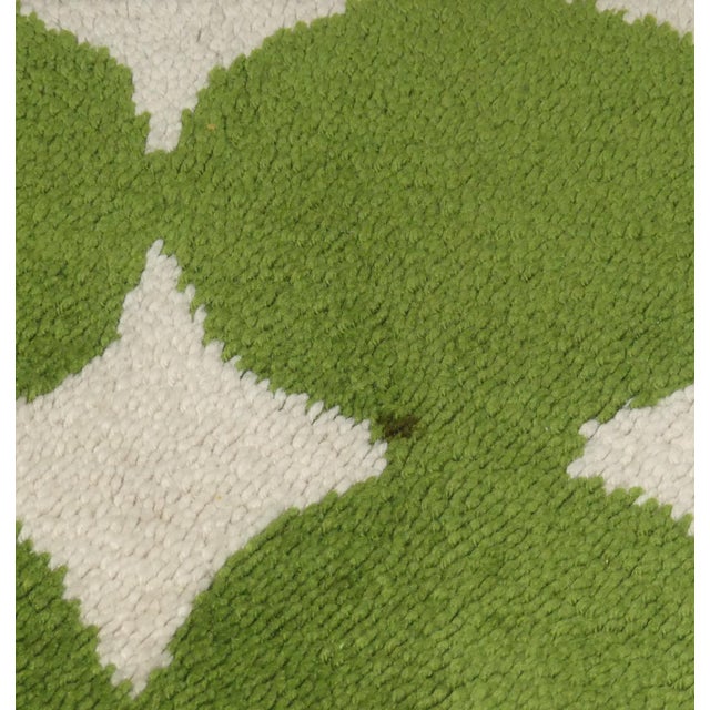 A highly decorative piece! Charming little rug with a period-typical pattern in off-white and green, with vibrant, bright...