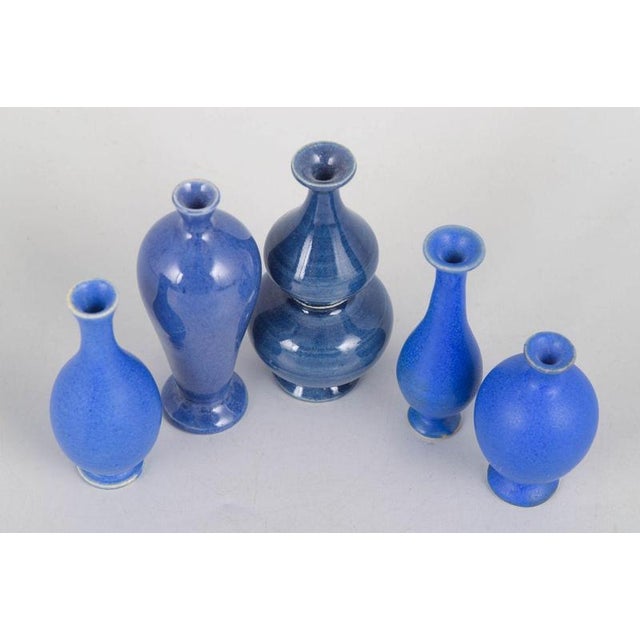 Per Liljegren, set of five miniature vases. Set of five hand-thrown miniature stoneware vases with elegant organic forms...