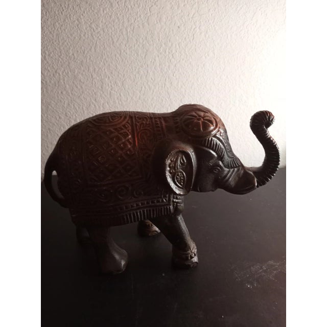 This is a vintage Solid Bronze Ornate 8"x11" Trunk-Up Elephant Figurine. Procured at auction BOX 15