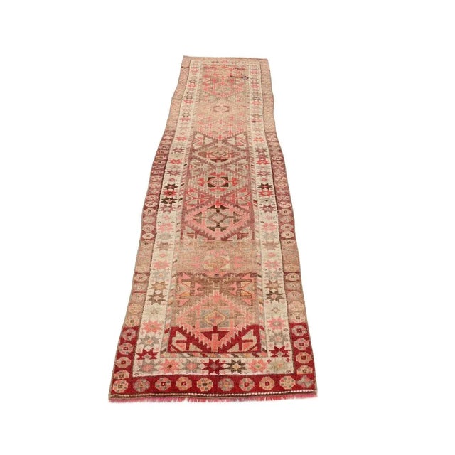 Handknotted vintage decorative Herki runner from Northern Iraq. Approximately 50-60 years old. In very good condition.