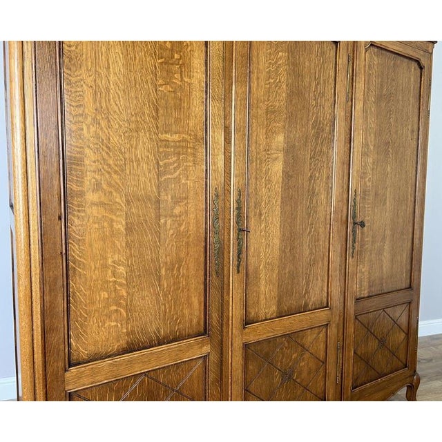 Vintage Louis XVI French Three Door Oak Carved Armoire For Sale - Image 6 of 13
