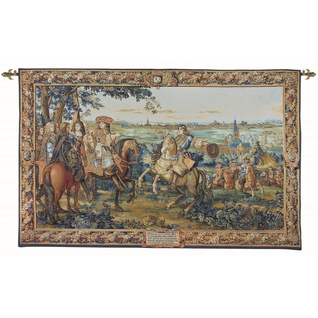 This tapestry depicts the capture of the town of Lille in August 1667 by the French army from the occupying Spaniards. The...