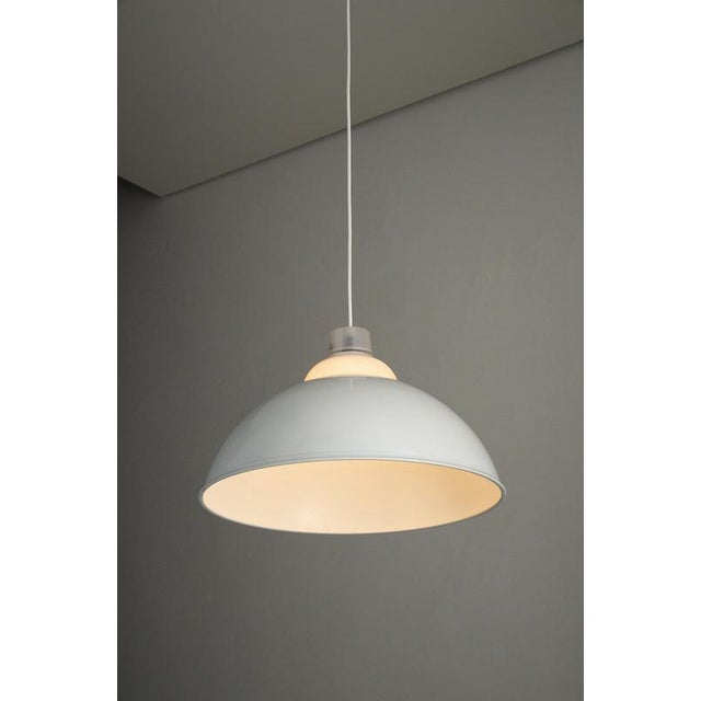 Pendant light produced by the Spanish lighting company Metalarte, likely in the late 1970s or 1980s. Known for their...