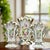 This set of three antique French vases is crafted from fine Old Paris porcelain, dating to the 19th century. The set...