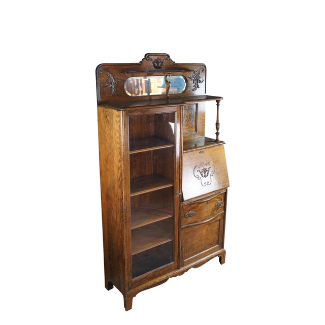 Antique Victorian side by side / secretary desk / bookcase / display case. Made of quartersawn oak featuring Art Nouveau...