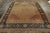 Hand knotted in wool originating circa 1890-1900, this 8x10 antique Persian rug connotes a regal Mohtashem rug...