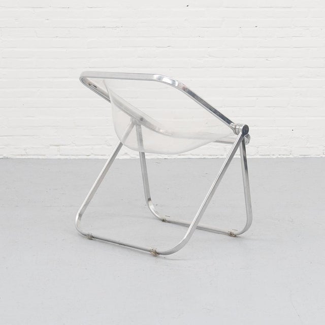 Original Plona chair, designed by Giancarlo Piretti for Castelli in the 1970s. The chair features a polished aluminium...