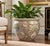 A beautifully decorated vintage Chinese porcelain fishbowl planter featuring an elaborate Famille Rose-style palette and...