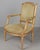 A Louis XVI style French fauteuil, or arm chair, with solid carved and gilded beech wood frame. Nice carved details....