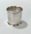 A substantial antique sterling silver napkin ring featuring an elegant engraved script monogram. Its unusually wide band,...