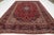 Elevate your space with this stunning, authentic vintage rug. Hand-knotted from high-quality, durable wool, it features a...