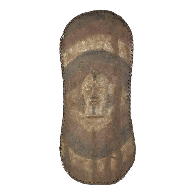 Early 20th Century Songye Shield with Kifwebe Mask Icon For Sale