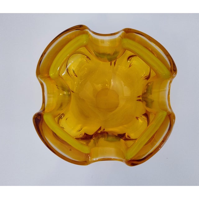 Fantastic murano glass bowl/ ashtray in amber. Very heavy, first class quality. In excellent vintage condition with no...