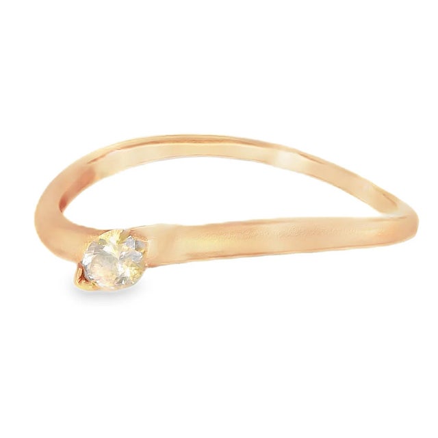 18K pink rose gold designer stacking ring featuring a natural marquise-cut pink diamond (5 mm x 3 mm). Sleek 1/8-inch wide...