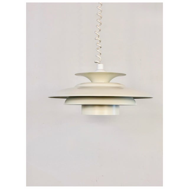 Danish pendant lamp by Top-Lamper (mark sign) Beautiful diffusion of the light Adjustable in height This piece has an...