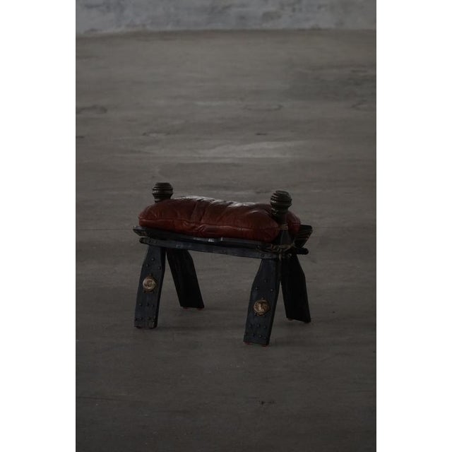Moroccan Dark Red Upholstered Camel Saddle Ottoman, North Africa, 1940s For Sale - Image 15 of 17