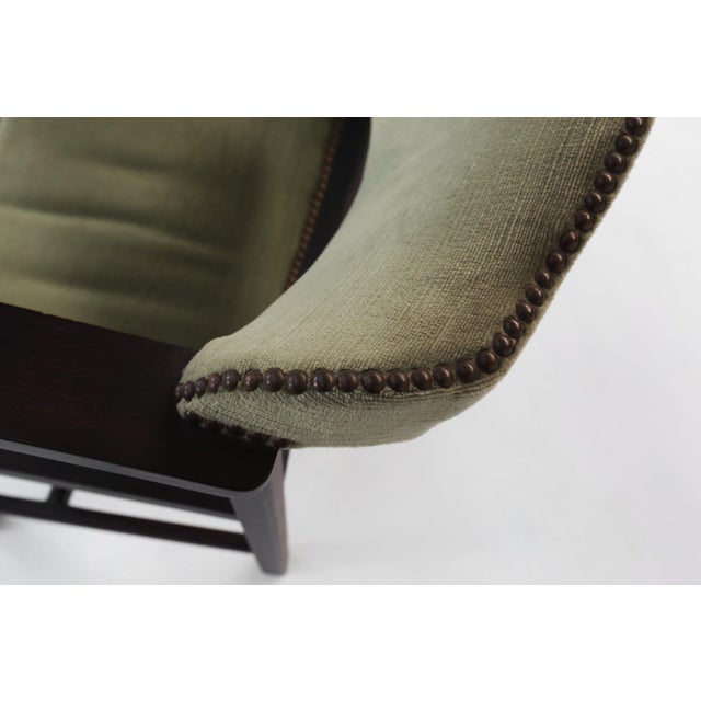 A refined embodiment of Belgian Art Deco elegance, this sculptural armchair from circa 1930 combines bold geometry with...