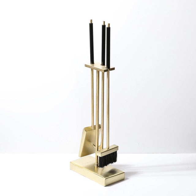 This Mid-Century Modernist Fire Tool Set in Brushed Brass and Black Enamel originates from the United States during the...