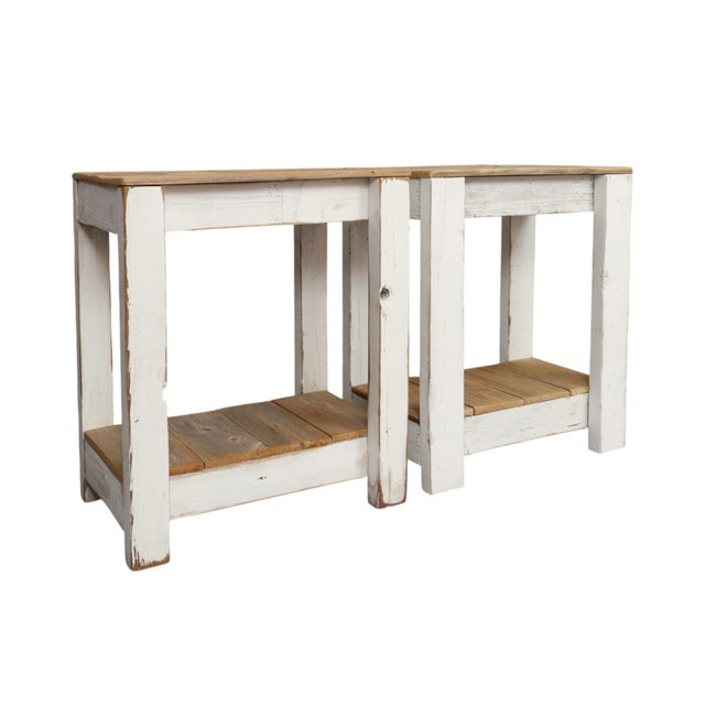 A pair of custom-made farmhouse style side tables. Pine planks are painted white on the frame with distressed edges and...