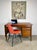 A beautiful and functional teak Arne Vodder style Danish modern drop-leaf desk with two drawers, circa 1960’s. Drawer...