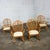 Handsome vintage Coastal Island Style or Hollywood Regency balloon back rattan dining chairs set of 4 with off-white...