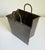 Presenting a vintage mid-century modern Italian brass shopping bag sculptural vase. Produced in the 1960s and 1970s, these...