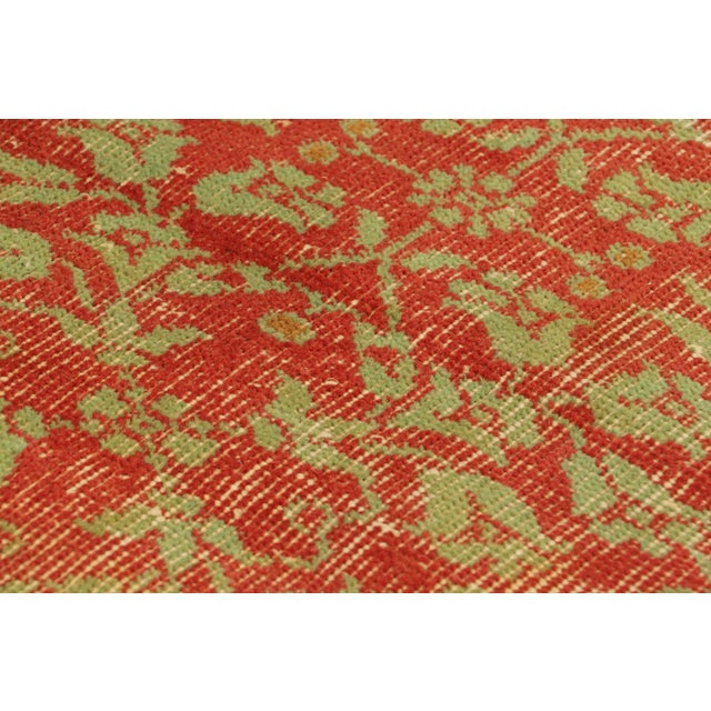 Hand-knotted in wool and originating from Turkey circa 1960 – 1970, this 1x4 vintage Zeki Müren runner is a unique...