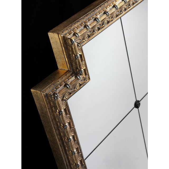 Handcrafted in Italy, this wall mirror features a solid wood frame finished in brushed 24k gold leaf with a decorative...