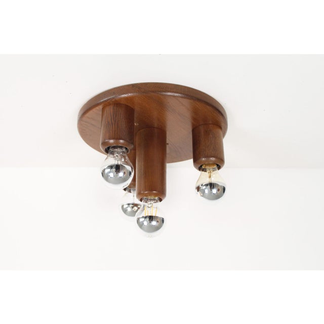 Unique solid wood ‘japandi’ style ceiling light. New old stock from the 1970’s, so in great and unused condition. Made in...