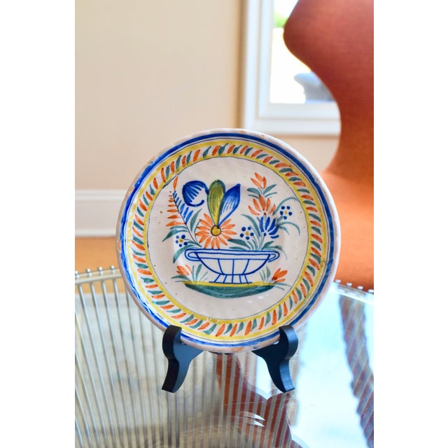 HENRIOT QUIMPER FAIENCE PLATE Designer: Henriot (Signed) Era: Victorian (1870-1895) OVERVIEW: Exquisite hand-painted...