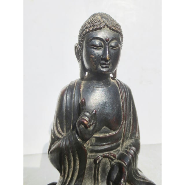Fine reproduction bronze of Liao Dynasty Seated Buddha (circa 10th century), in the Classic style, with a double-lotus...