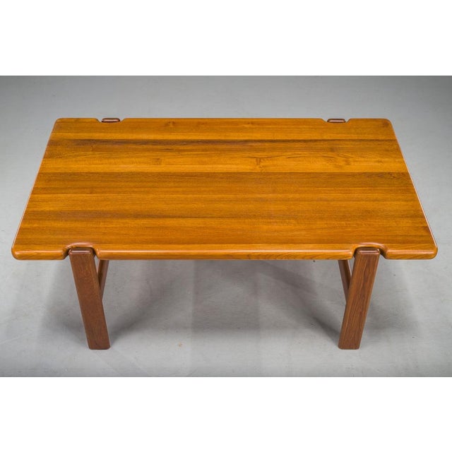 Niels Bach coffee table made from solid teak wood. This Danish designer from the 60s and 70s designed for multiple Danish...