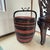 A mid-20th century Chinese wedding or dowry basket constructed of hand-split bamboo and finished in traditional red and...
