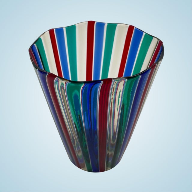 A Murano glass vase designed by Gio Ponti for Venini, made between the 1950s and 1960s. The piece is characterized by its...