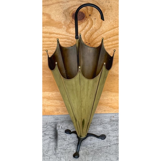 Antique English Brass and Iron Umbrella Stand in the Form of an Umbrella, Circa 1900 Whimsical yet refined, this antique...