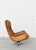 Impressive armchair by De Sede from the 1970s. Swivel and with a rocking mechanism. The design was made world-famous by...